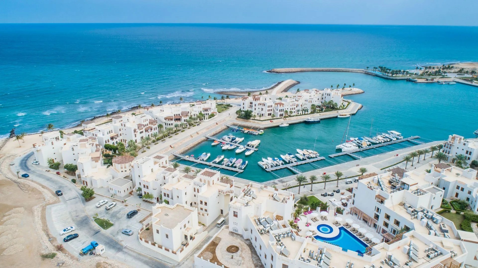 Aerial view of Jebel Sifah marina and resort on the Gulf of Oman