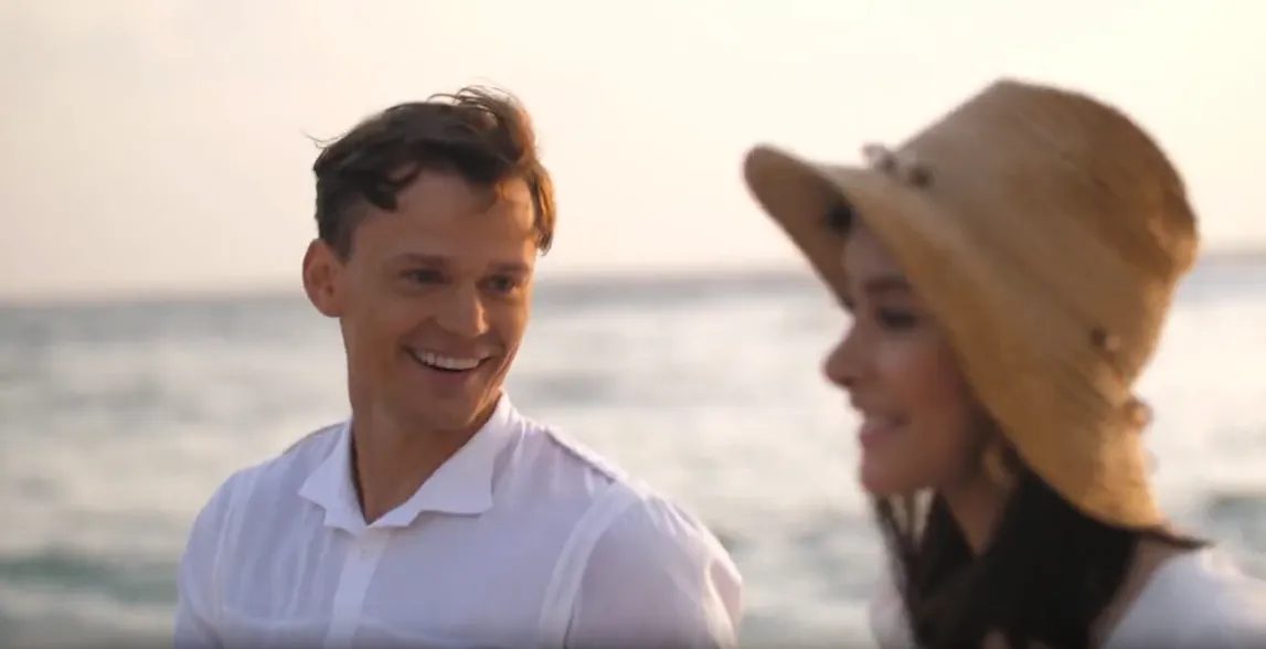 Jebel Sifah — couple on the beach at sunset