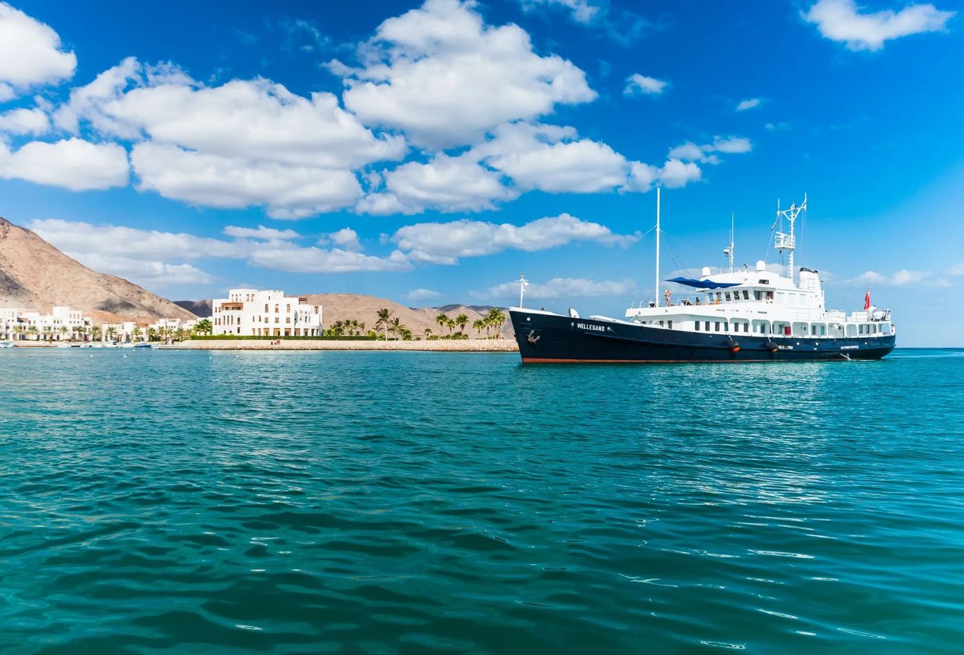 Jebel Sifah — yachts on the turquoise water