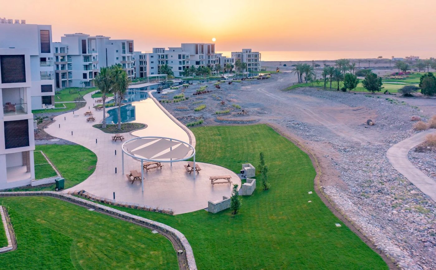 Jebel Sifah — apartments, pool and lawns from above